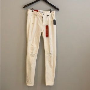 BRAND NEW White ripped skinny jeans